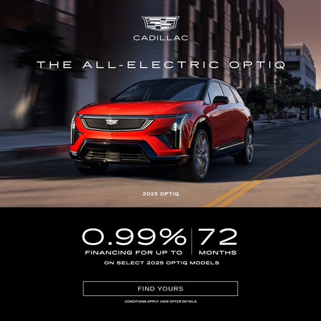 Red 2025 Cadillac Optiq electric car on city street; offers financing at 0.99% for 72 months.