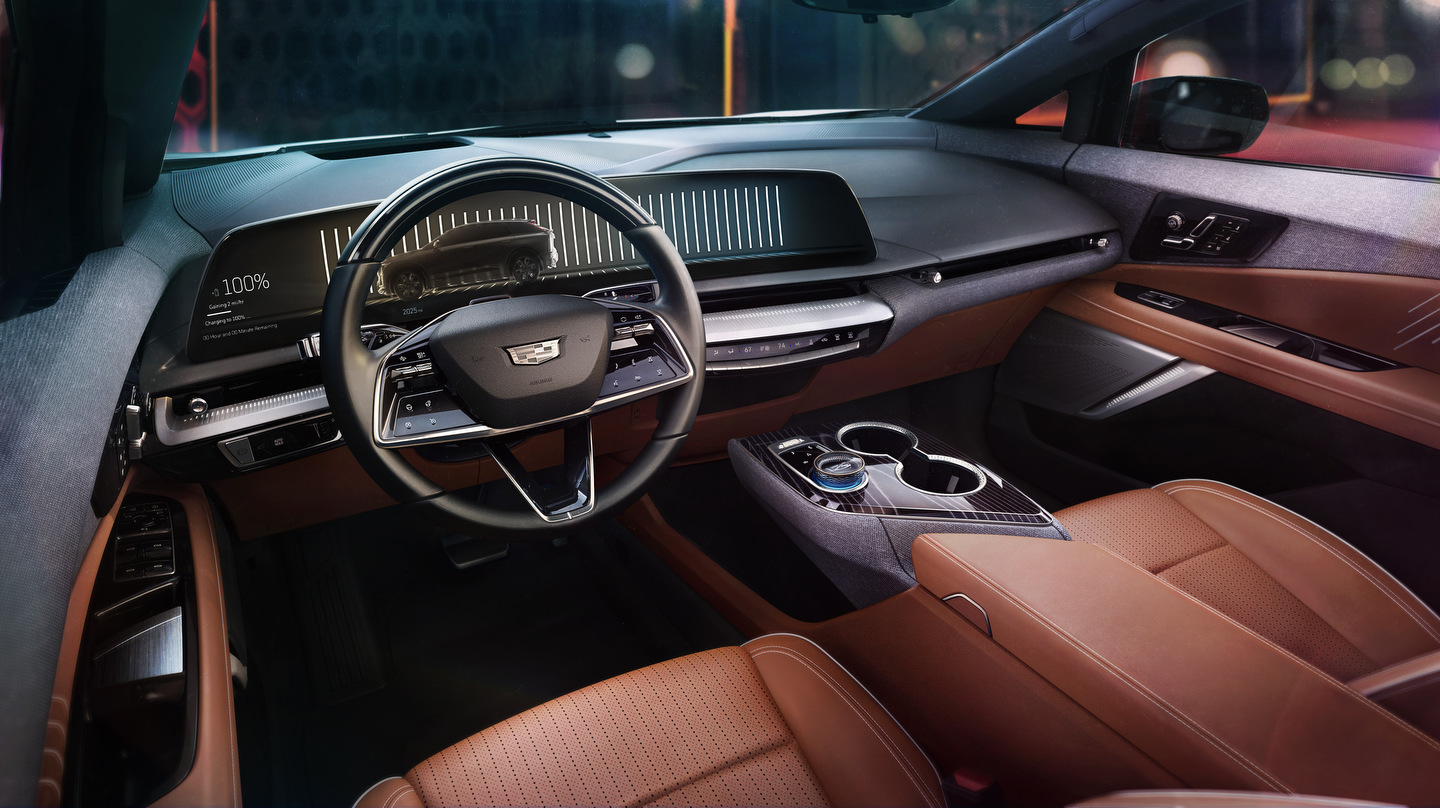Luxurious car interior with a digital dashboard, leather seats, and sleek steering wheel.